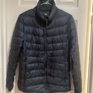 Winter Jacket
Lightweight Very warm
Nylon shell
Down Filled
Navy 
Large